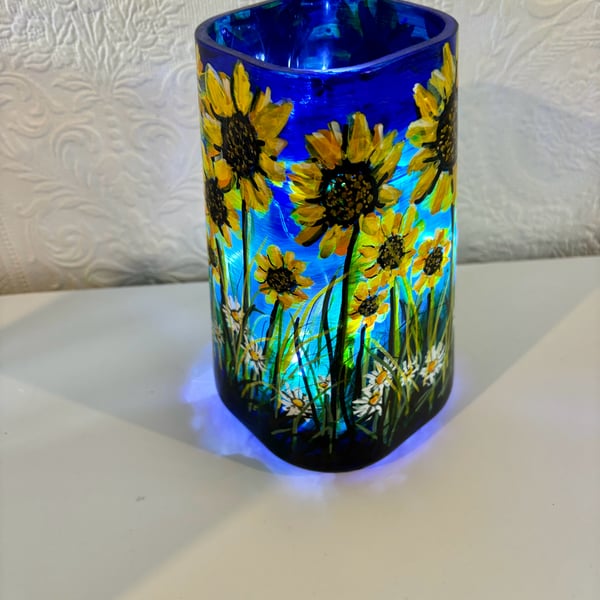 A hand painted and fired glass vase by Andrew Jenkins 