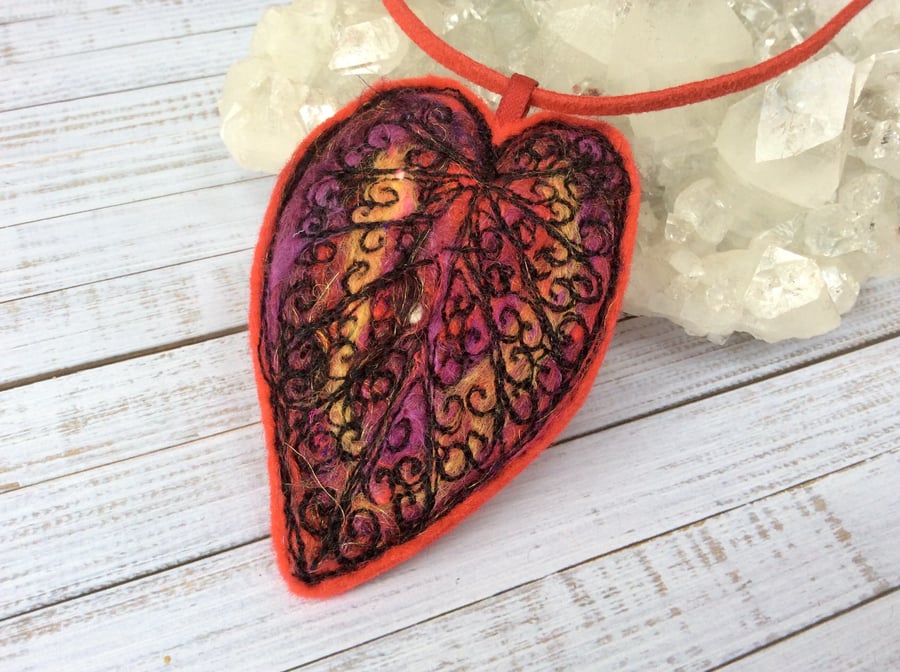 Embroidered spiral patterned needle felted leaf necklace. 