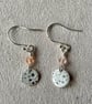 Circular silver earrings with bubble pattern and pale pink Swarovski crystals  - Image 1