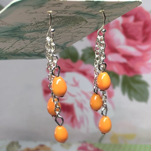 Tangerine glass teardrop chain earrings 