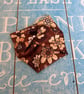 Wide fabric cuff bracelet in retro brown design - Image 1
