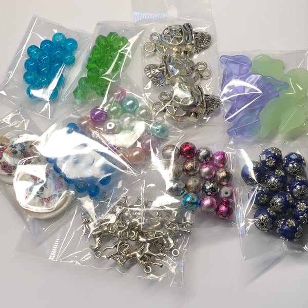 Ten packs jewellery making charms and beads