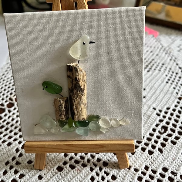 Seaglass seagull picture on an easel . Flock on the Dock 