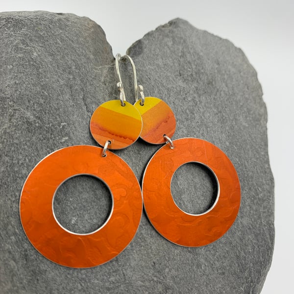 Orange and yellow hoop and circle statement aluminium earrings 