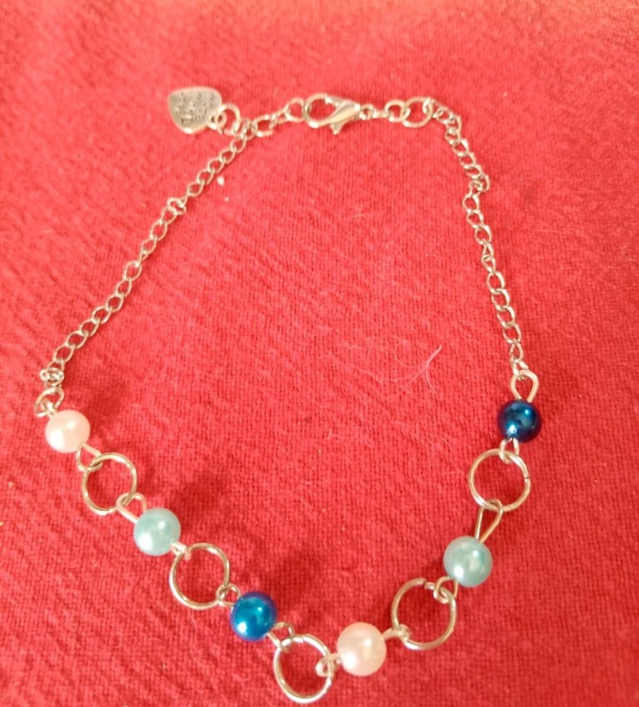 Handmade silver plated bracelet with beads.