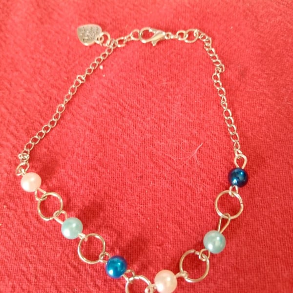 Handmade silver plated bracelet with beads.