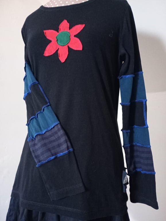Patchwork top with flower applique