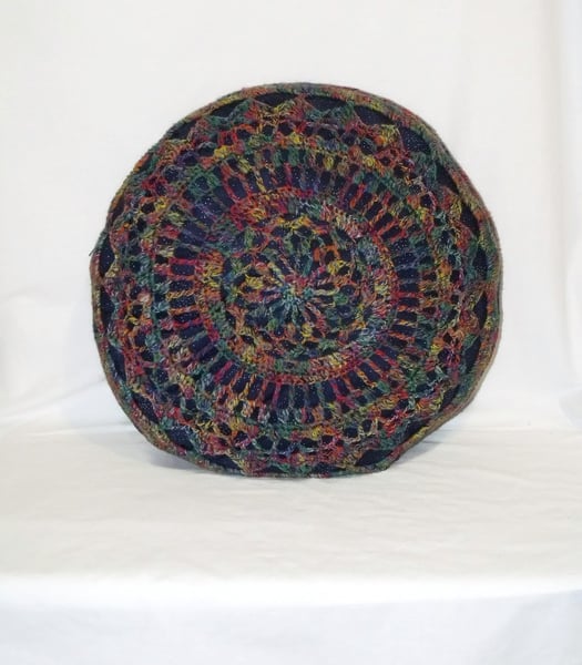 multicoloured crocheted mandala scatter cushion, big circular blue throw pillow