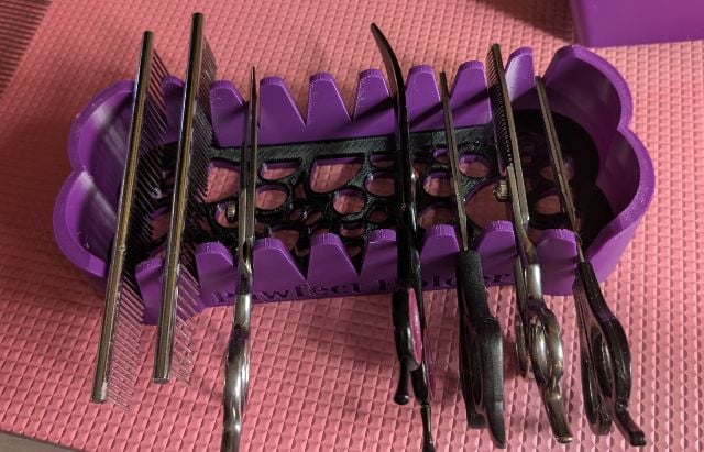 Pawfect holder for scissors and combs