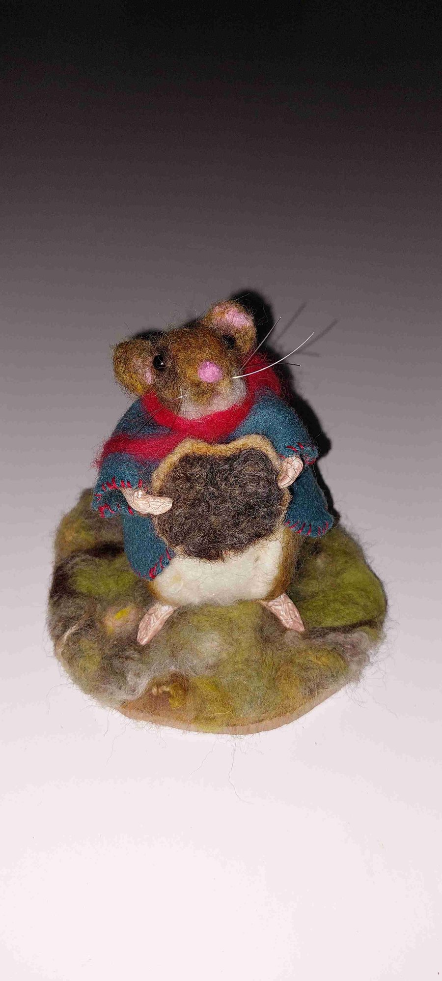 Mouse nibbling on a chocolate biscuit needle felt sculpture 