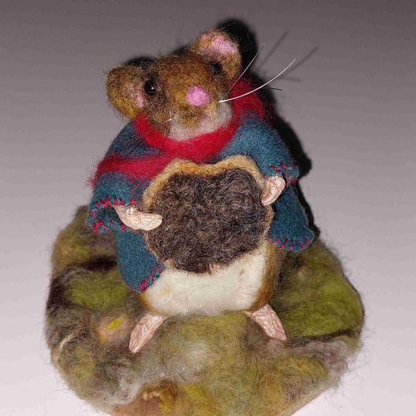 Mouse nibbling on a chocolate biscuit needle felt sculpture 