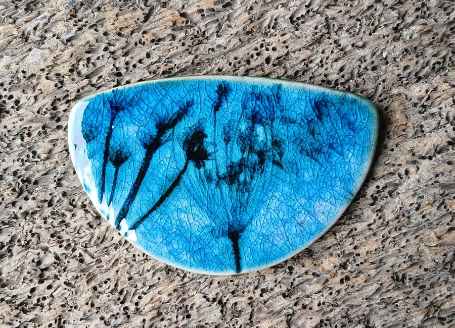 Seed head brooch