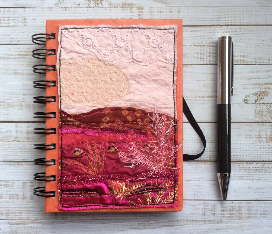 Embroidered up-cycled landscape A6 lined notebook. 