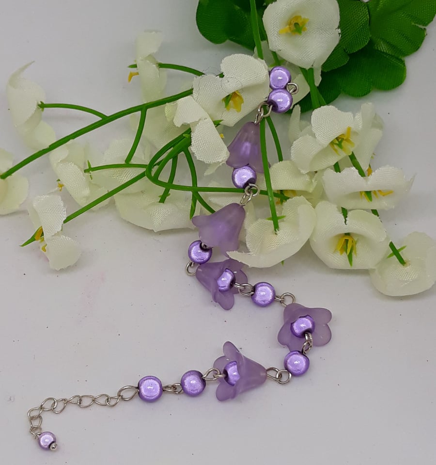 BR326 Purple Lucite flower bracelet
