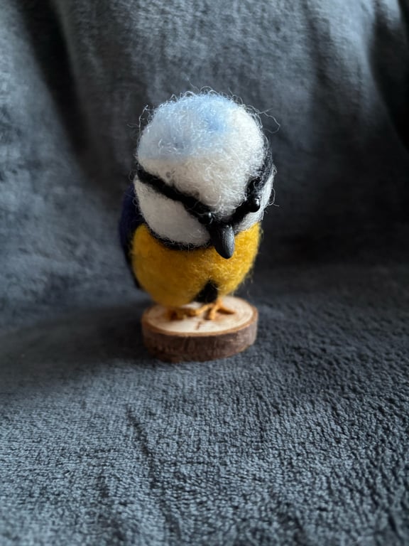 Needle felted blue tit on wood slice