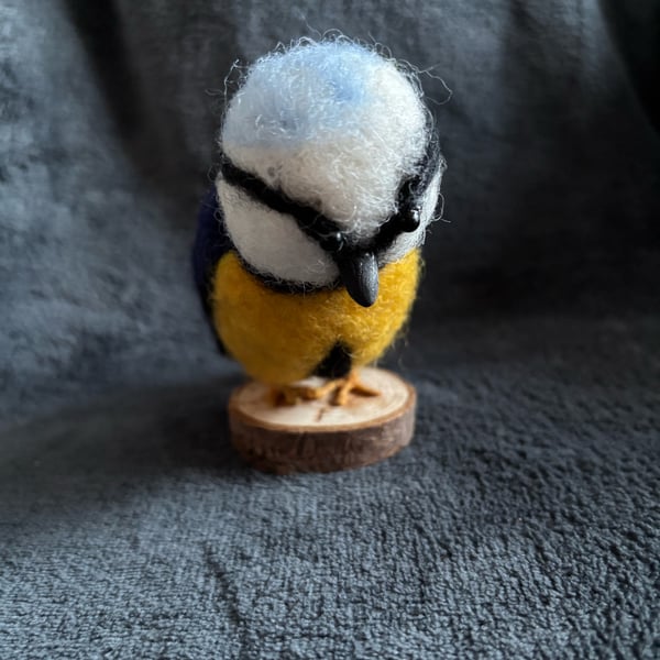 Needle felted blue tit on wood slice