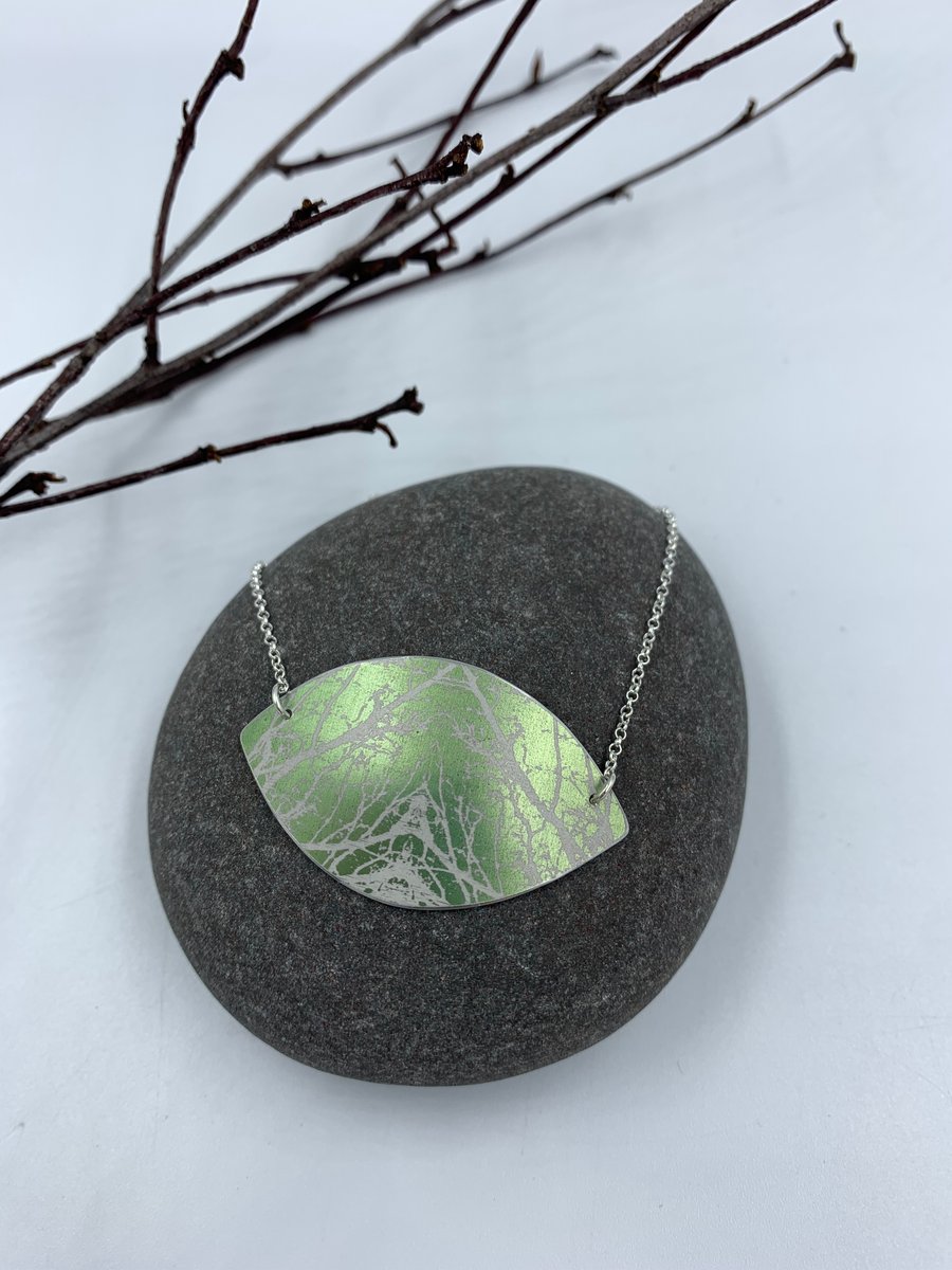 Sage green aluminium pendant with tree design