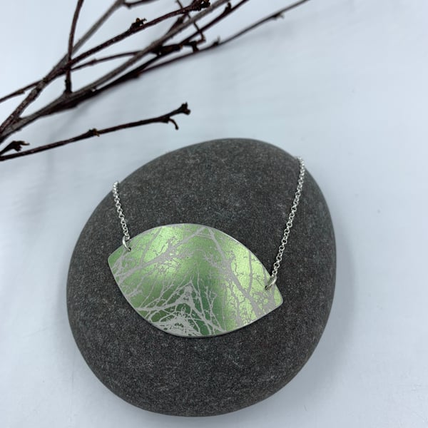 Sage green aluminium pendant with tree design