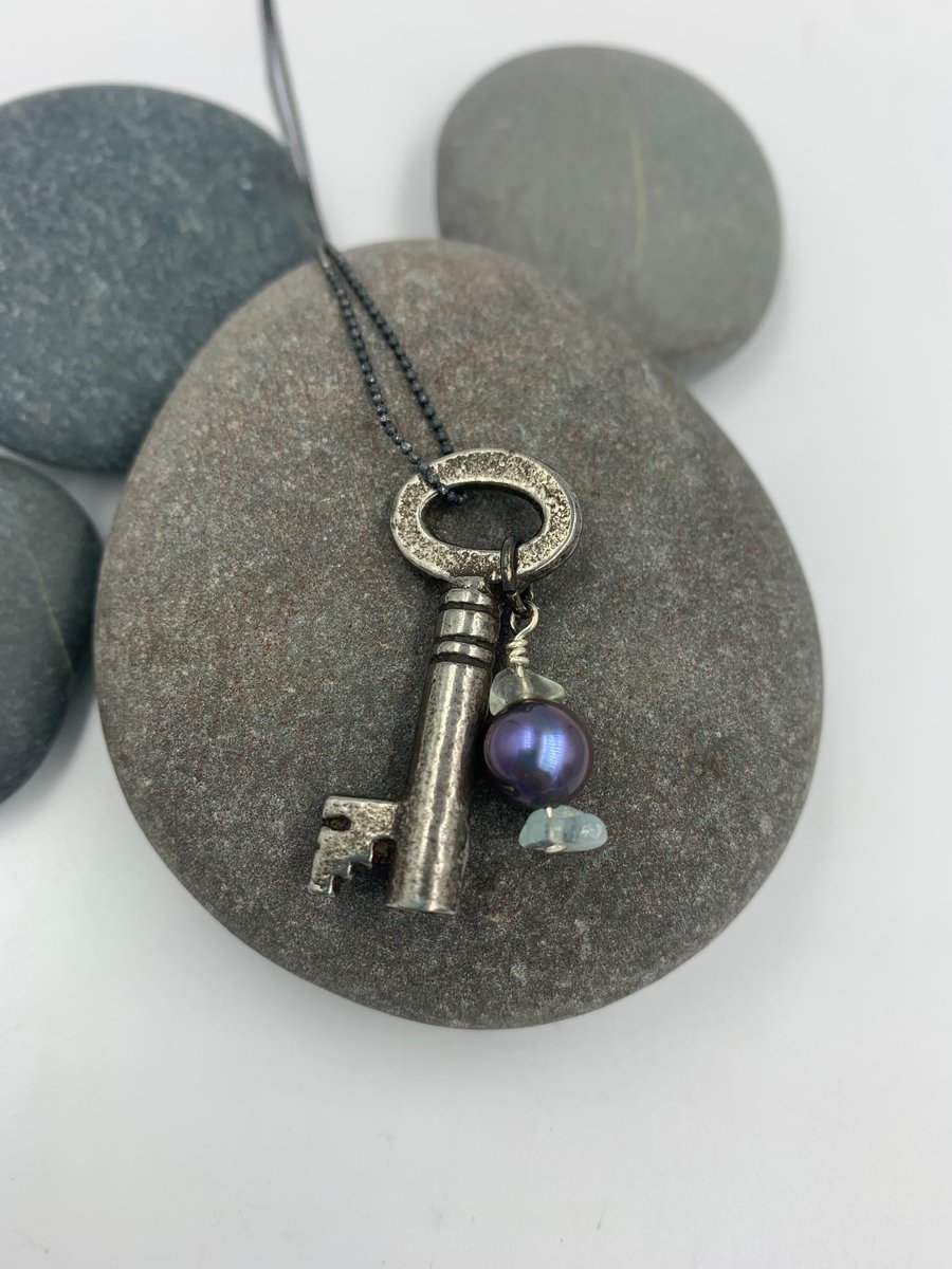 Vintage key pendant with freshwater pearls on a silver chain