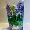 A hand painted and fired glass vase by Andrew Jenkins