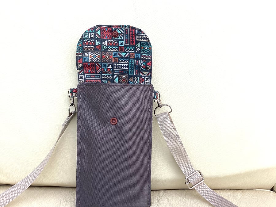 Cross body mobile phone bag, adjustable strap phone bag, waterproof phone bag.