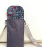 Cross body mobile phone bag, adjustable strap phone bag, waterproof phone bag.