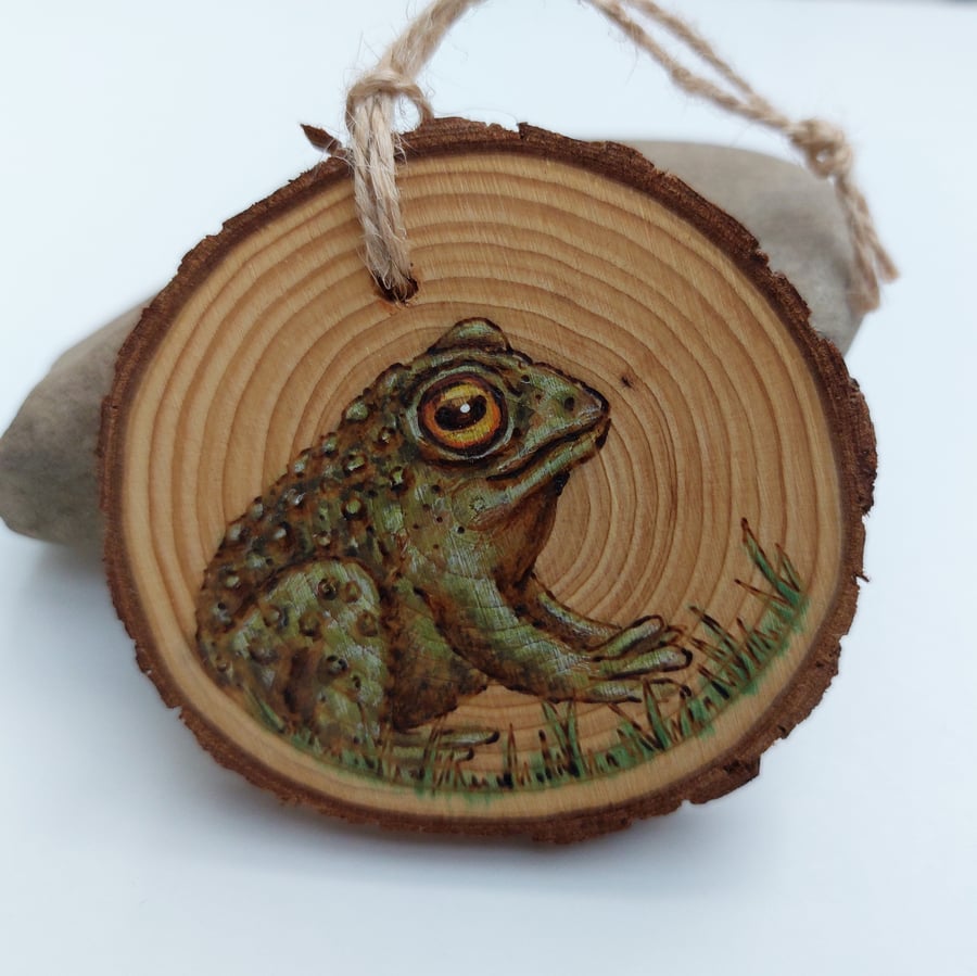 Frog pyrography log slice ornament 