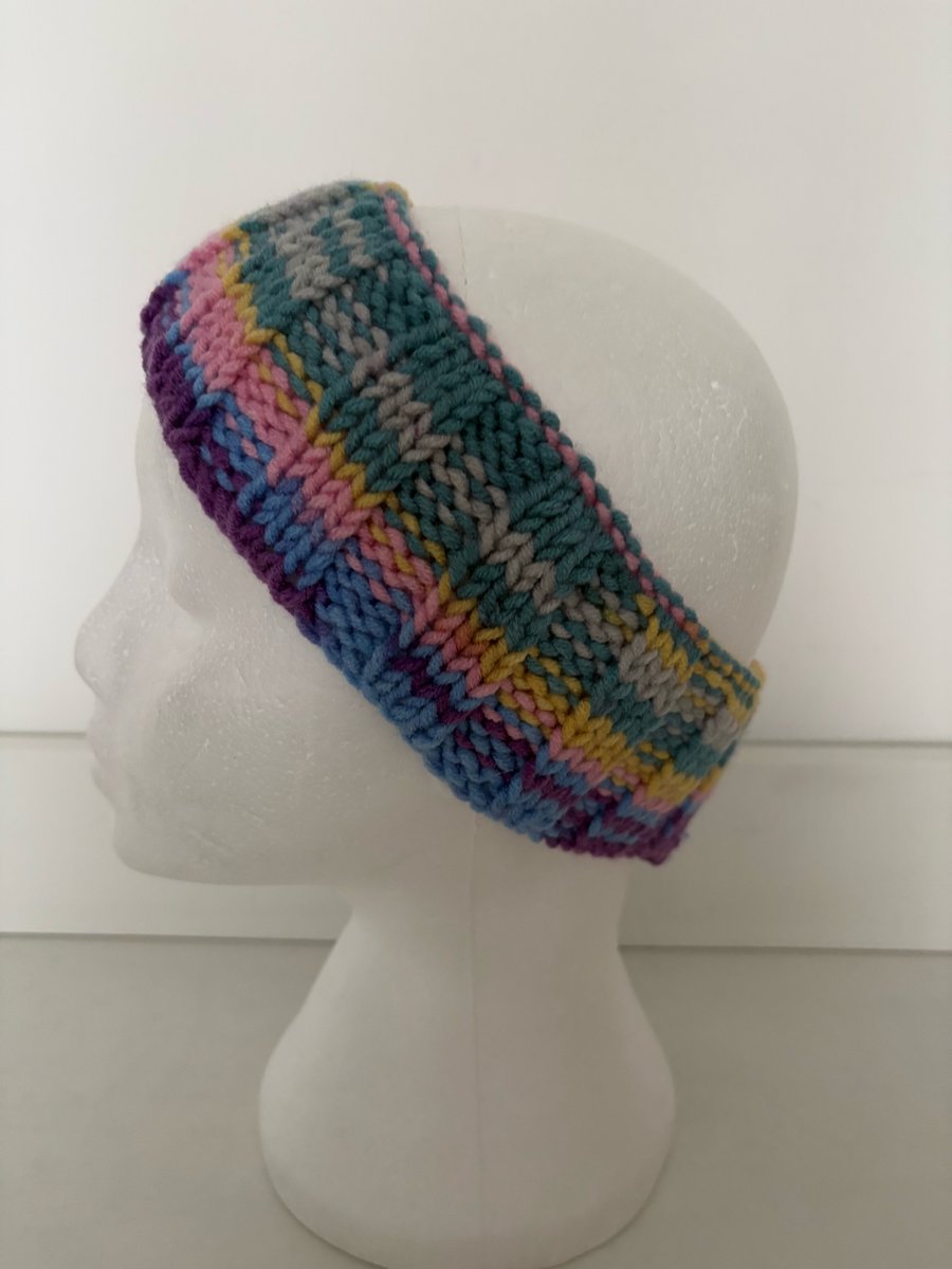 Hand knitted headband. 