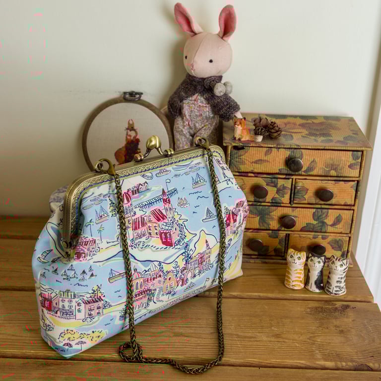 Larger frame clutch bag with internal zip in Liberty cotton