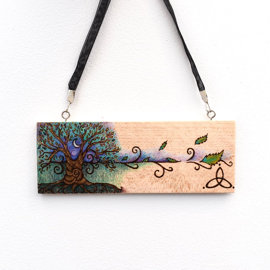 The triquetra tree. Pyrography hanging plaque. Pagan tree of life.