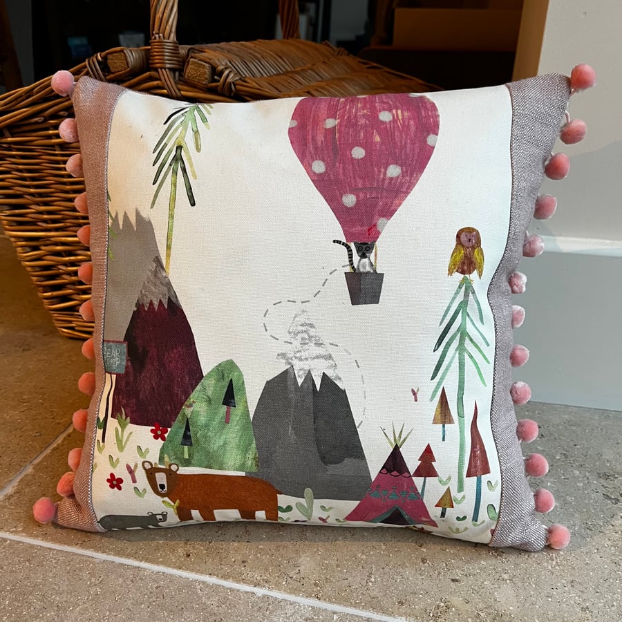 Cute cushion with bears, lemur, hot air balloon and pompoms