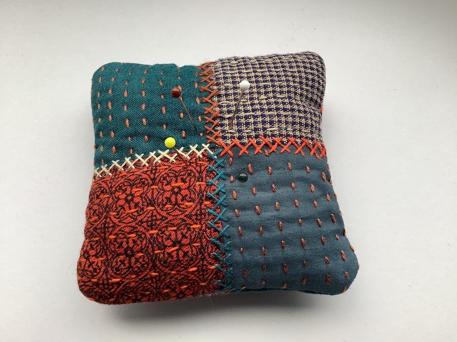 Handmade patchwork style pincushion