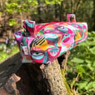 Makeup bag (small) in multicoloured abstract face print