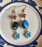 Teal flower and shell charm earrings