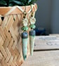 Artisan Ceramic Spike Earrings with Czech Glass Flowers. Cream, Bronze & Green - Image 3