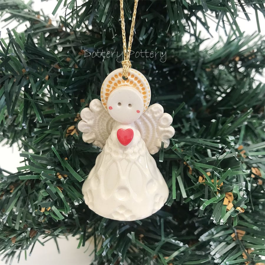 Teeny little ceramic angel Christmas angel red heart