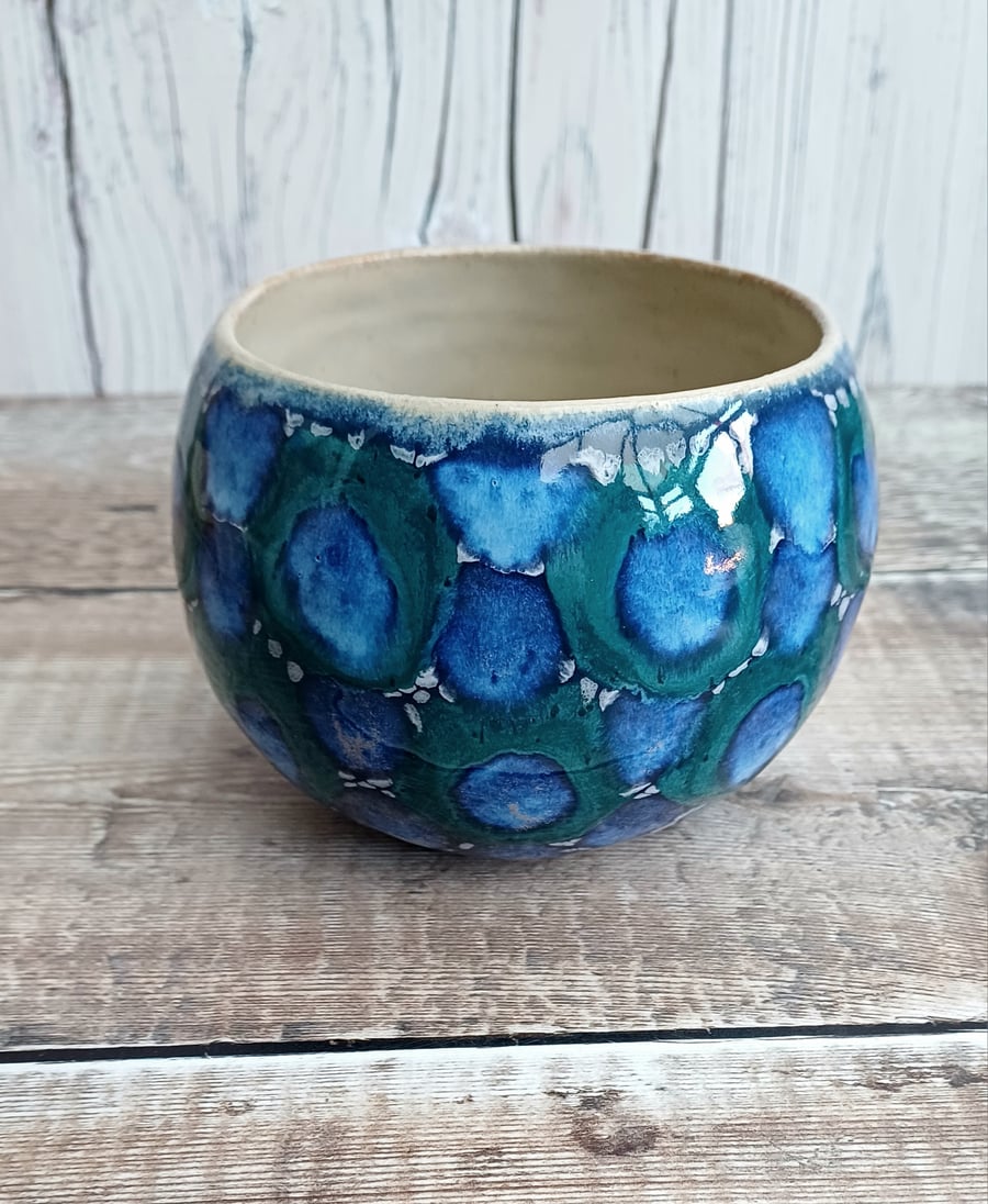 Pottery coiled pot in blue and teal