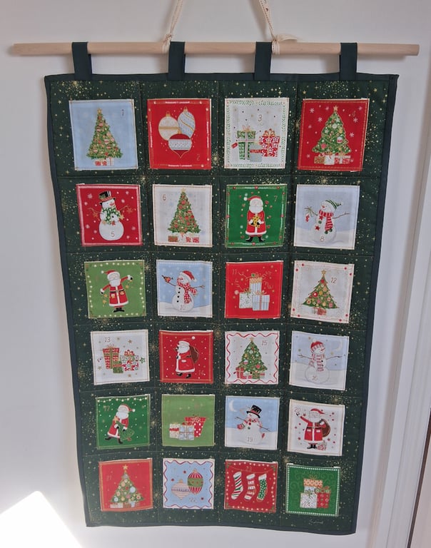 Handmade green fabric Advent Calendar with large pockets