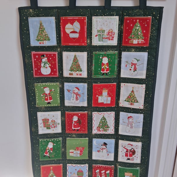 Handmade green fabric Advent Calendar with large pockets