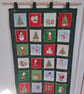 Handmade green fabric Advent Calendar with large pockets