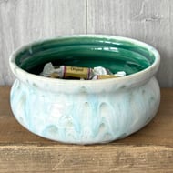 Ceramic hand thrown bowl with white and green drippy glaze