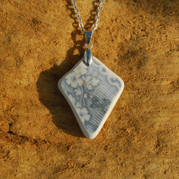 Grey flowers beach pottery pendant