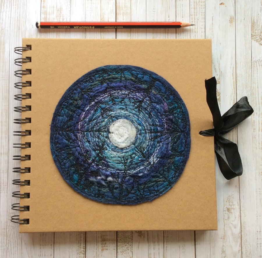 Square moonscape sketchbook or journal. 