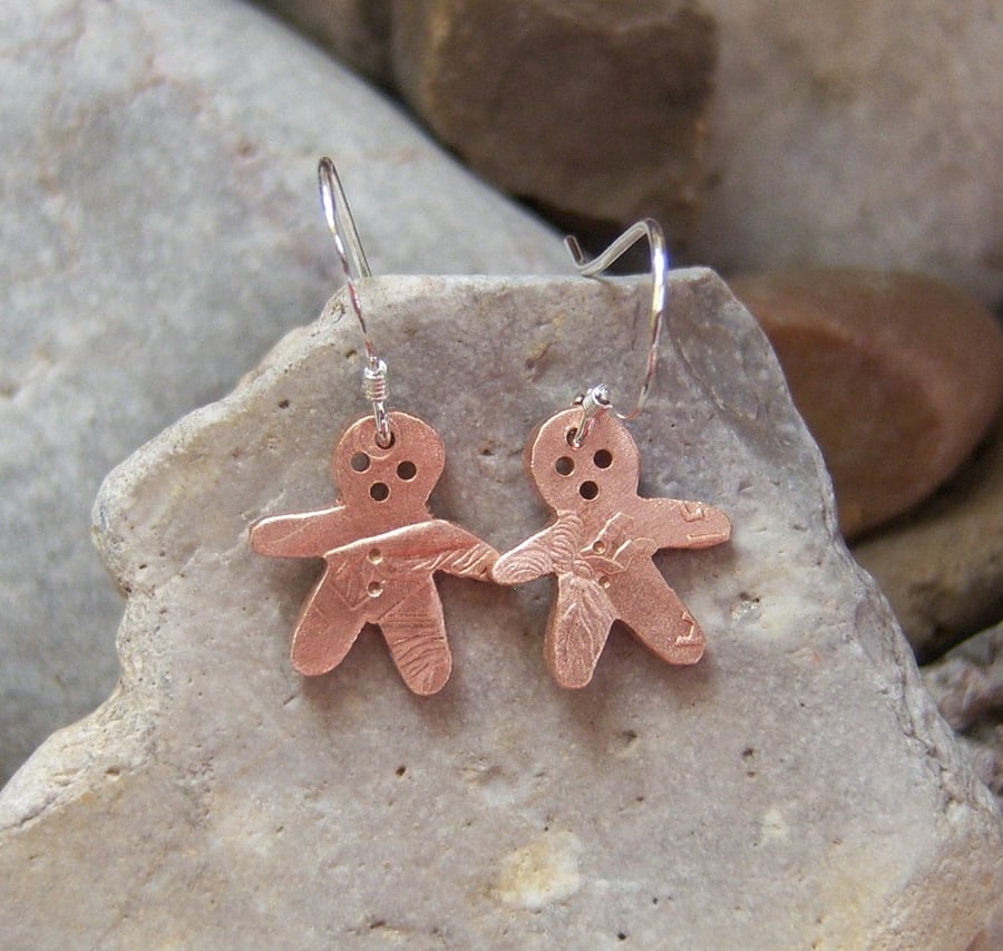 Gingerbreadman earrings recycled from a bronze coin