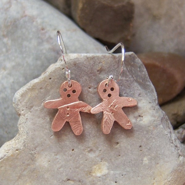 Gingerbreadman earrings recycled from a bronze coin