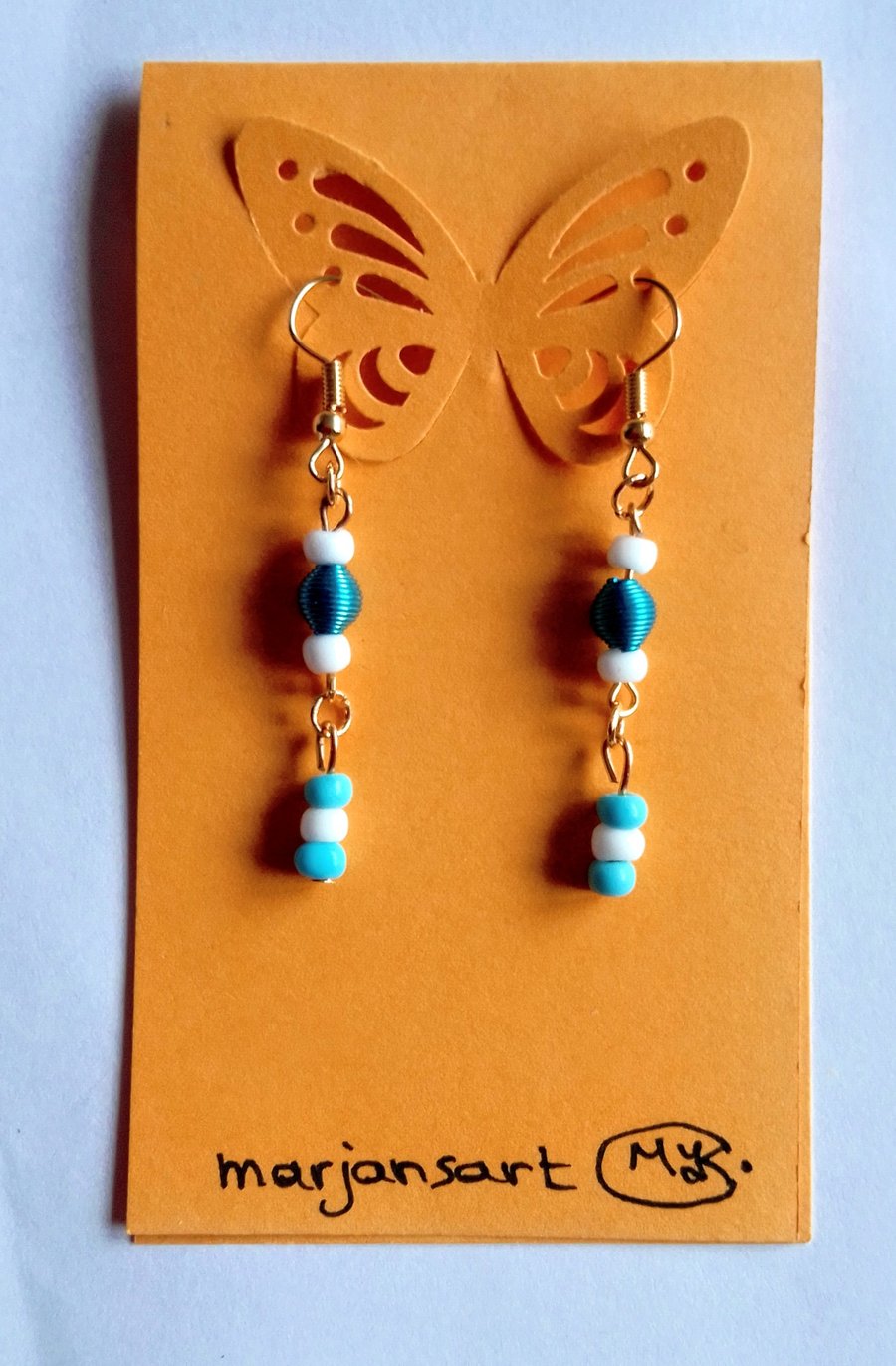 Blue and White Beads dangle earrings.