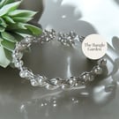 Handmade braided wire bangle with faux pearls