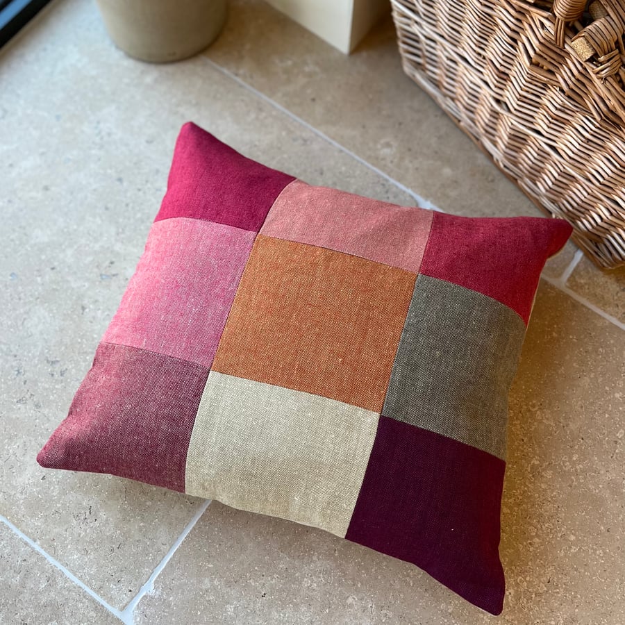Linen patchwork cushion cover in warm colours
