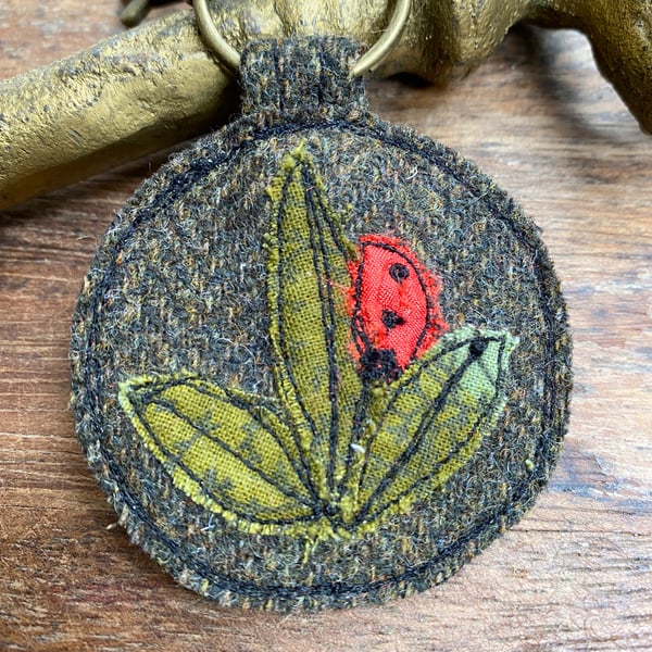 Up-cycled ladybird plaid key ring or bag charm. 
