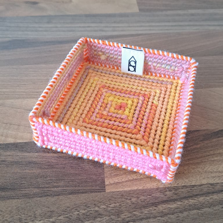 Container for small desk items - yellow, orange, pink colour